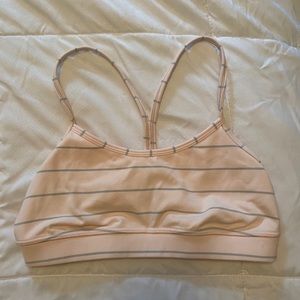 Lululemon pink sports bra with grey stripes